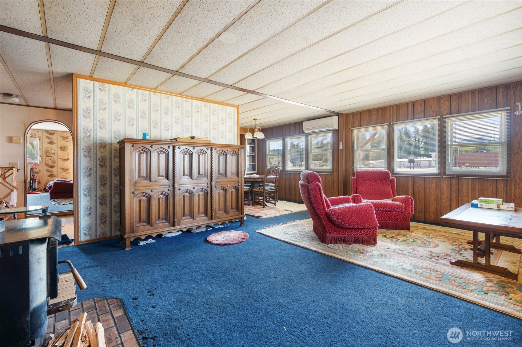 520 North Main Street, Unit F Pe Ell, WA 98572 - Photo 13 of 31 a living room with furniture a rug and a large window