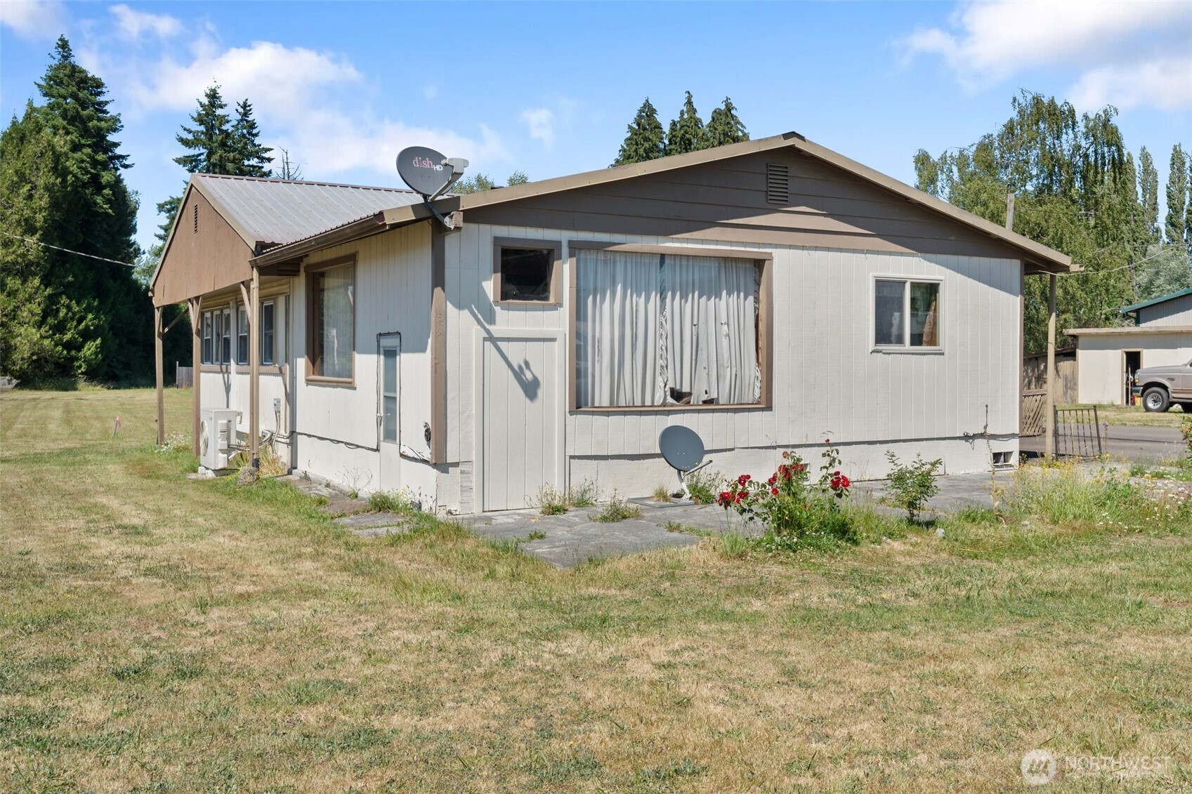 520 North Main Street, Unit F Pe Ell, WA 98572 - Photo 22 of 31 a front view of a house with a yard