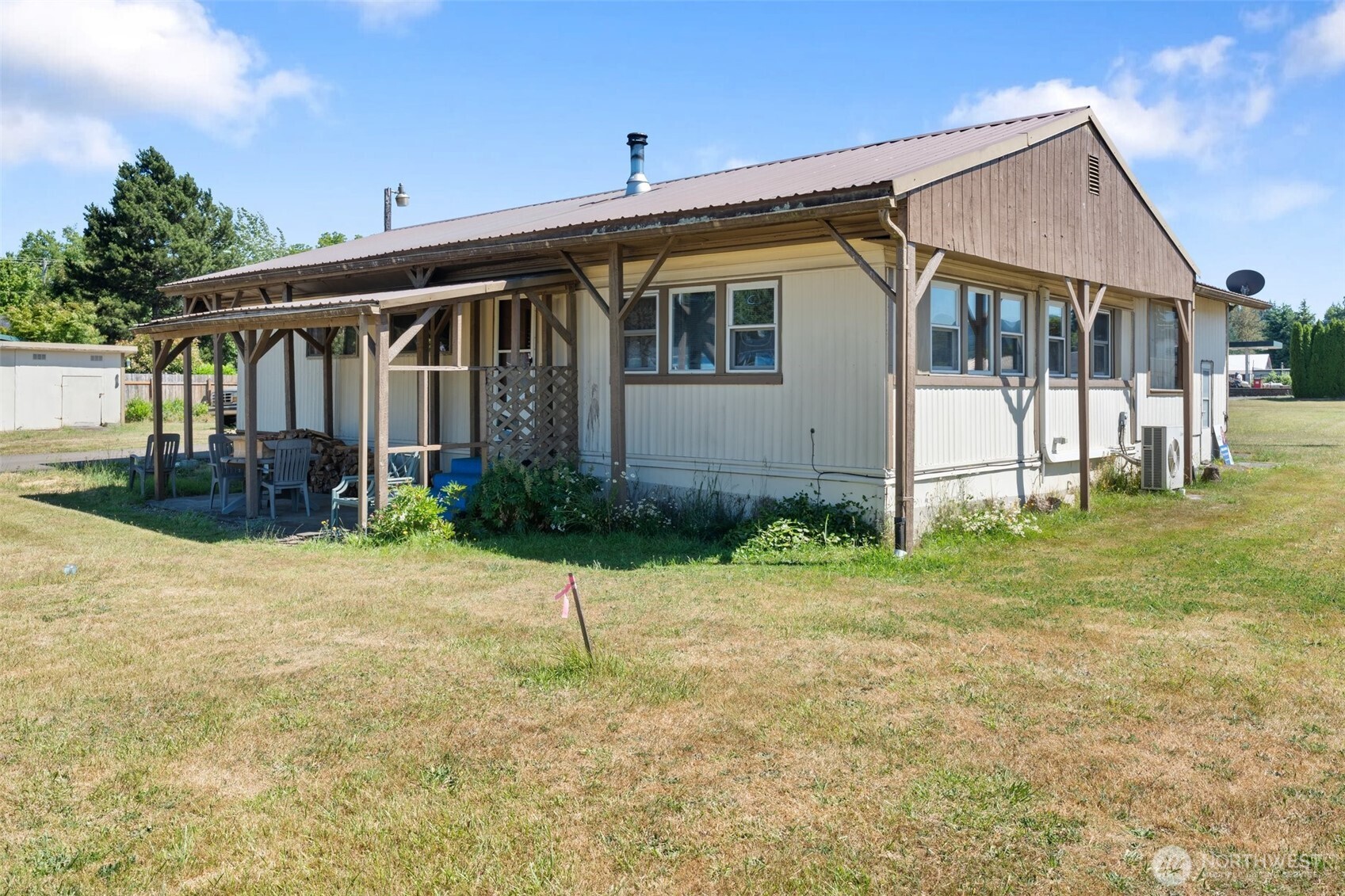 520 North Main Street, Unit F Pe Ell, WA 98572 - Photo 23 of 31 a front view of a house with a garden