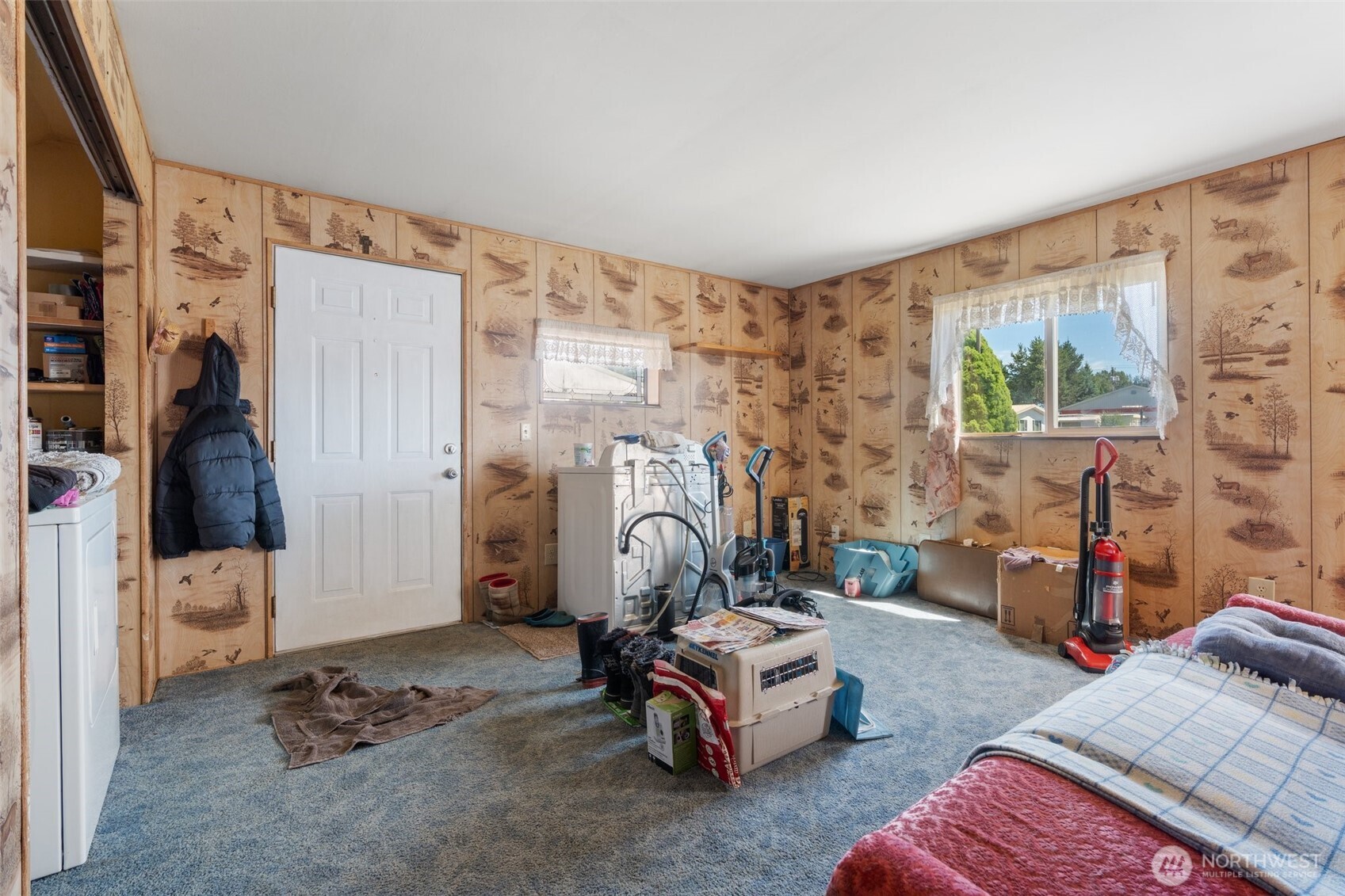 520 North Main Street, Unit F Pe Ell, WA 98572 - Photo 3 of 31 a bedroom with bed and a window