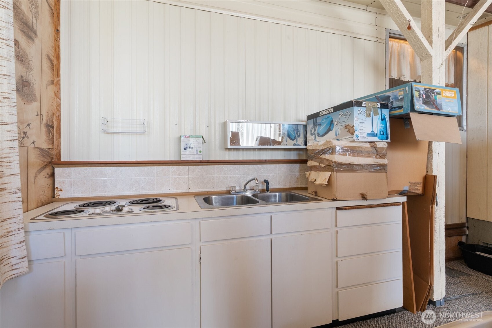520 North Main Street, Unit F Pe Ell, WA 98572 - Photo 5 of 31 a kitchen with stainless steel appliances granite countertop a sink and cabinets