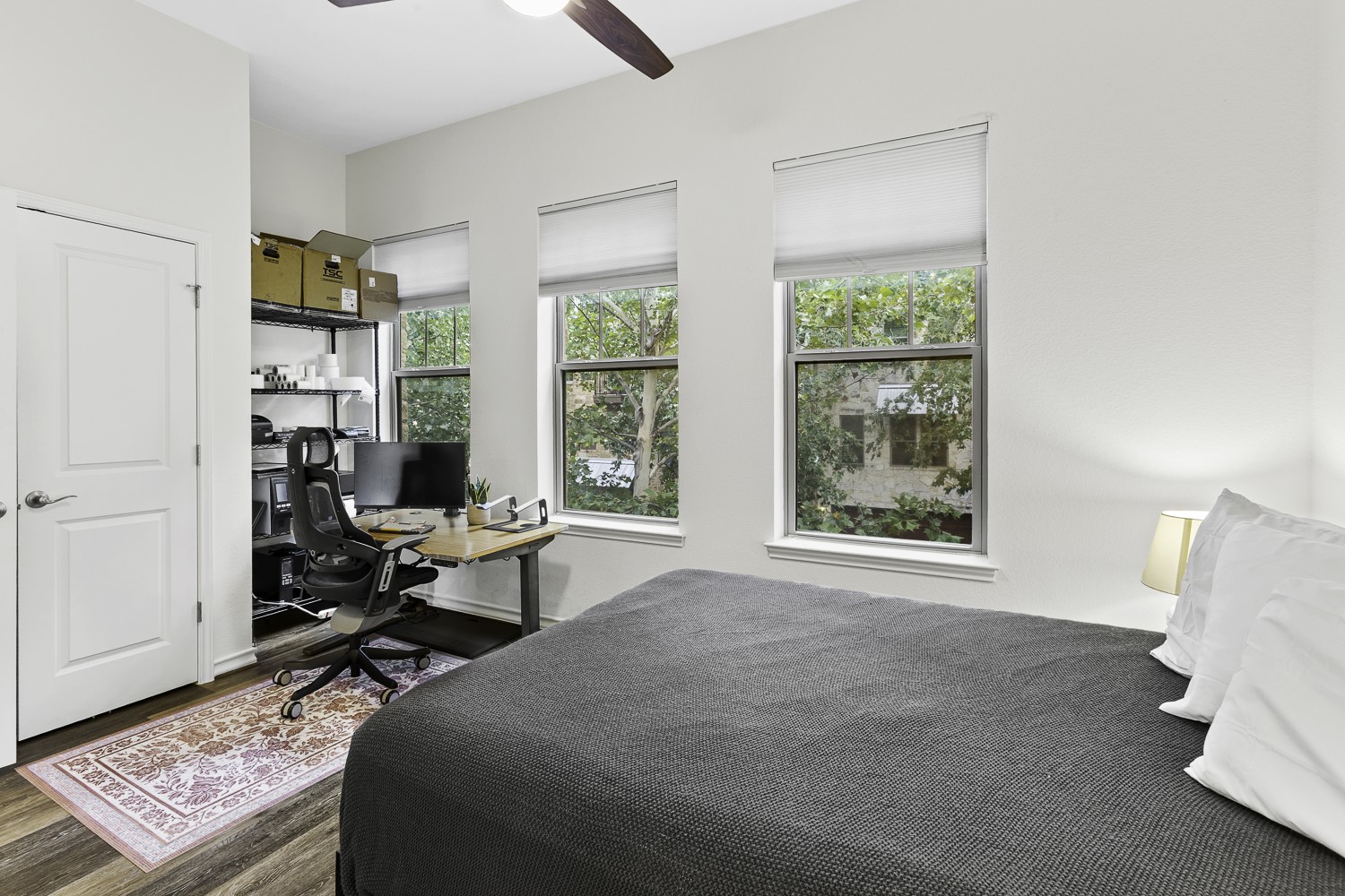 221 Adams Street Georgetown, TX 78628 - Photo 18 of 35 a bed room with a bed and a window