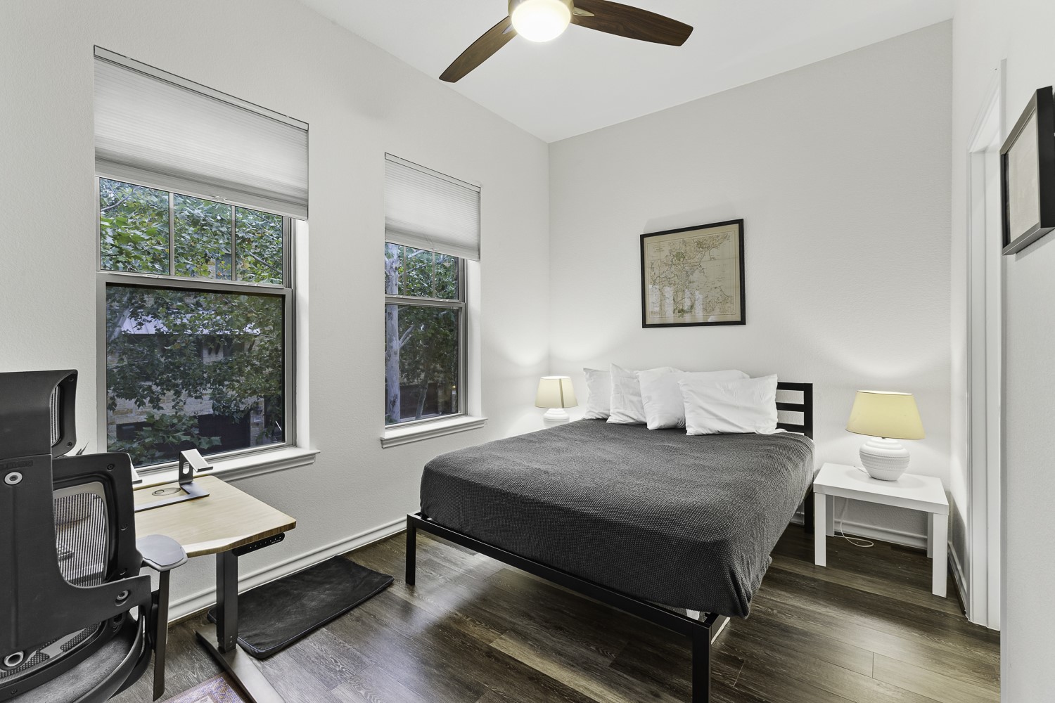 221 Adams Street Georgetown, TX 78628 - Photo 19 of 35 a bedroom with a bed and a table