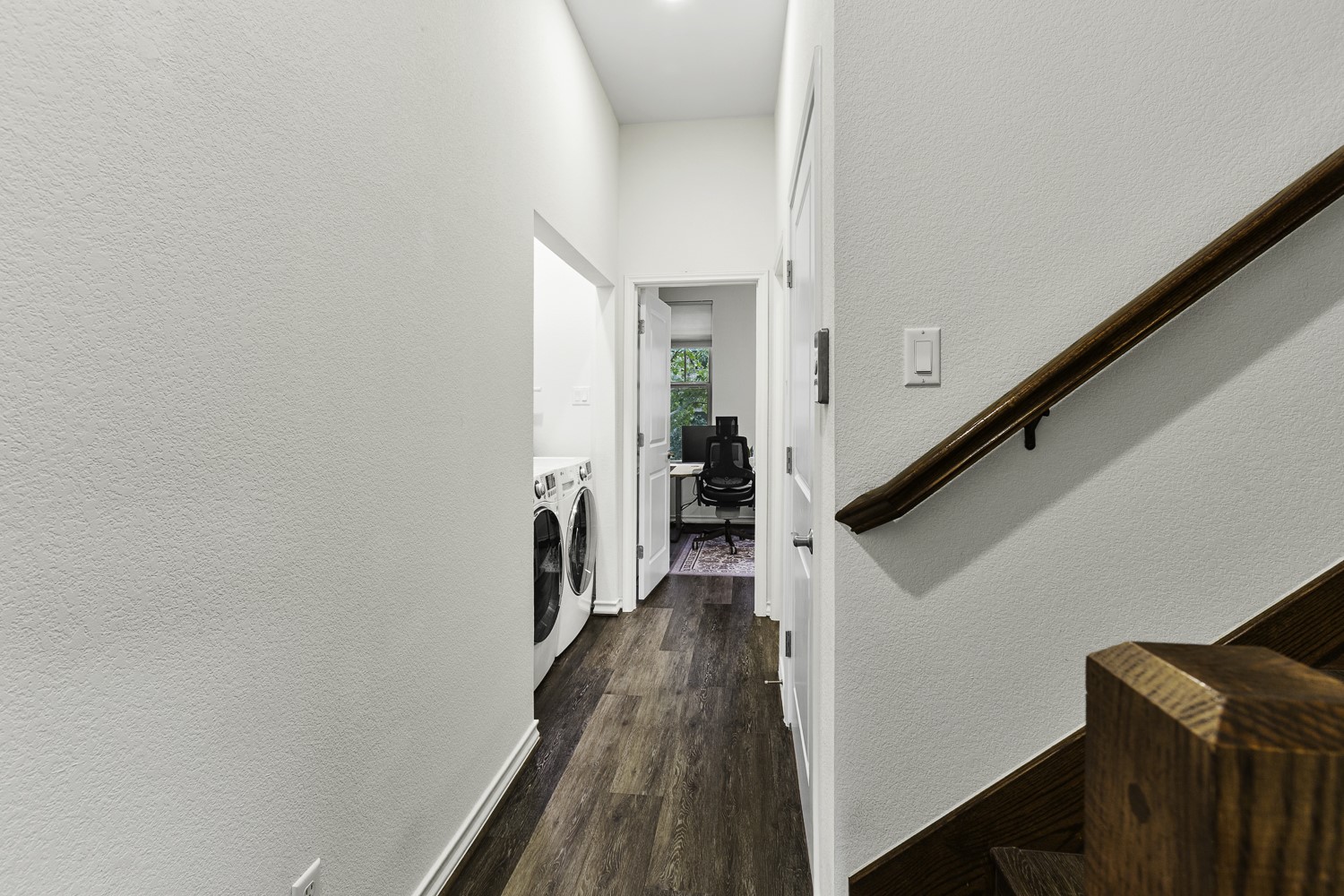 221 Adams Street Georgetown, TX 78628 - Photo 22 of 35 a view of a hallway with wooden floor and staircase