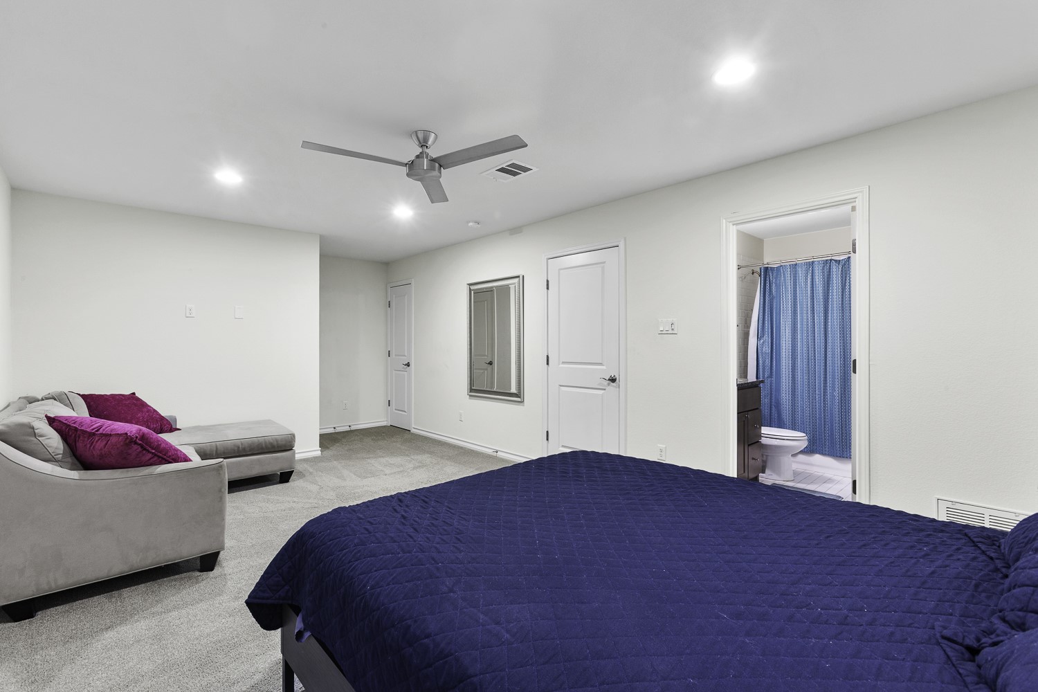 221 Adams Street Georgetown, TX 78628 - Photo 25 of 35 a bedroom with a bed and a couch