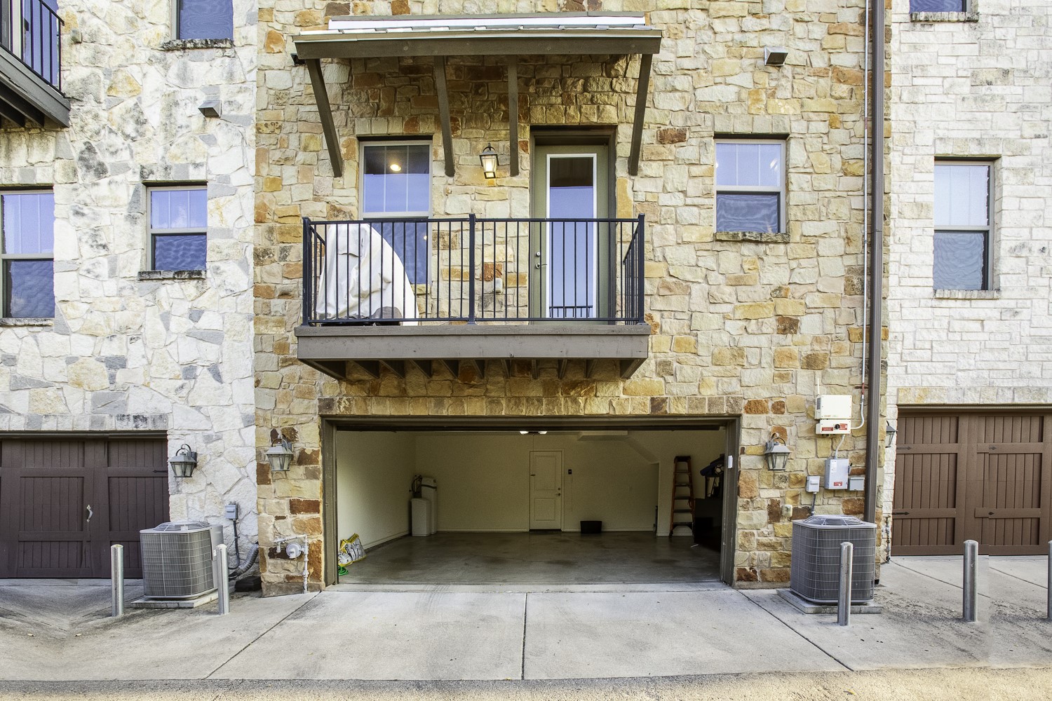 221 Adams Street Georgetown, TX 78628 - Photo 31 of 35 a front view of a building with entryway