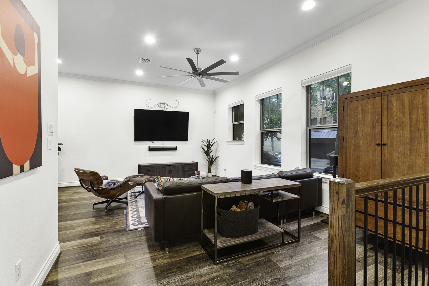 221 Adams Street Georgetown, TX 78628 - Photo 5 of 35 a living room with furniture and a flat screen tv
