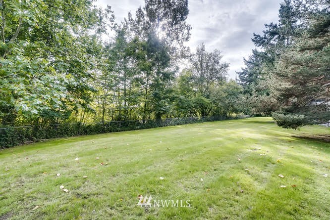 13801 Old Redmond Road, Unit A101 Redmond, WA 98052 - Photo 23 of 25 a view of a green yard