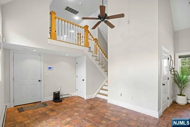 a view of a livingroom with a staircase