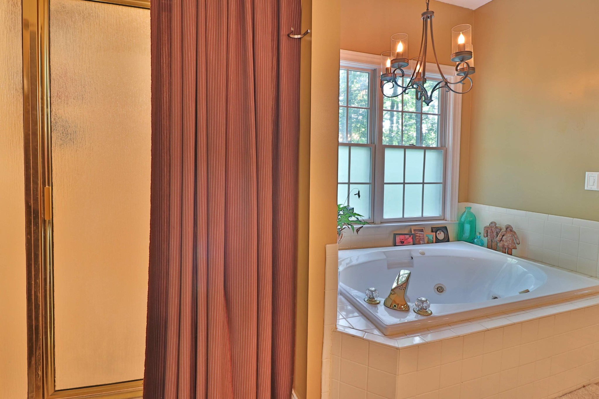 281 Lone Ridge Lane Clinton, TN 37716 - Photo 14 of 40 a bathroom with a tub and shower