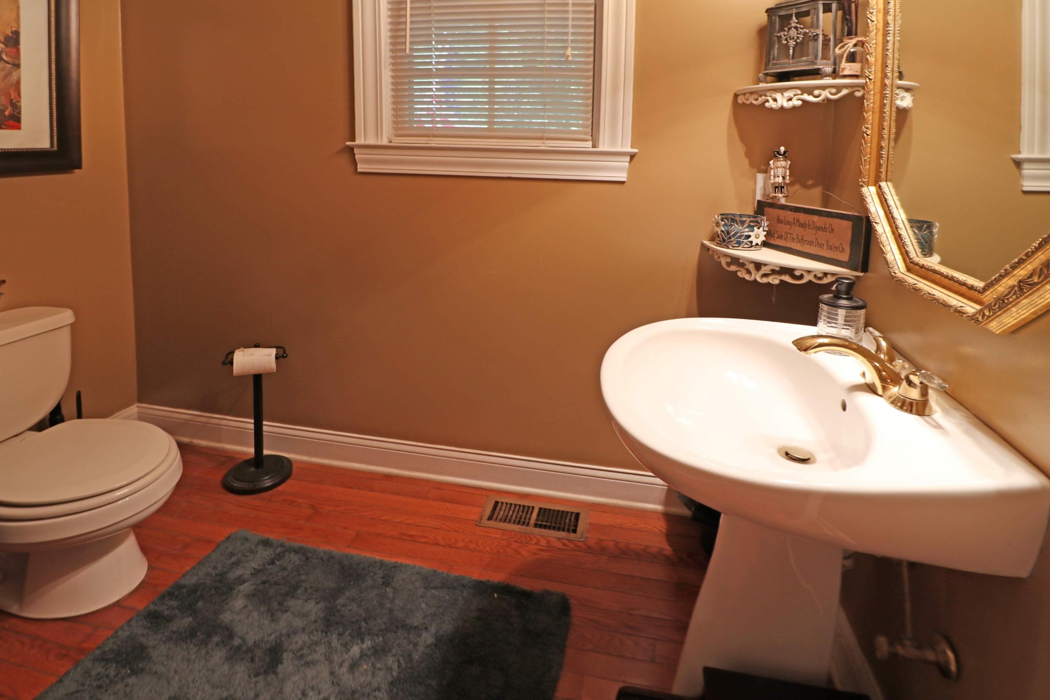 281 Lone Ridge Lane Clinton, TN 37716 - Photo 16 of 40 a bathroom with a sink mirror and toilet