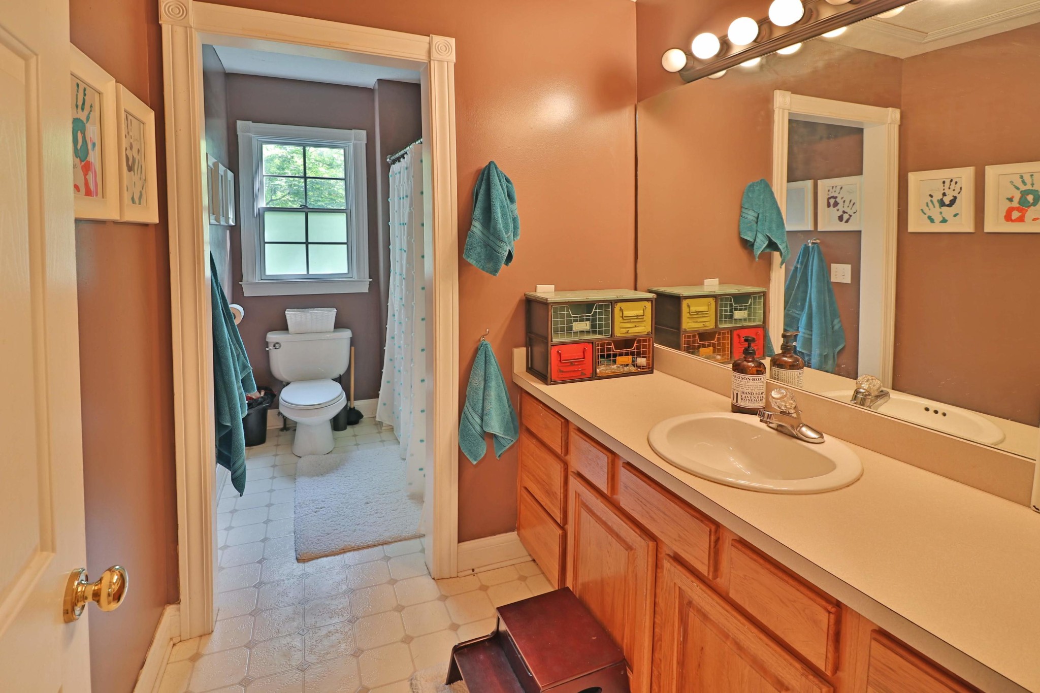281 Lone Ridge Lane Clinton, TN 37716 - Photo 23 of 40 a bathroom with a sink and a mirror