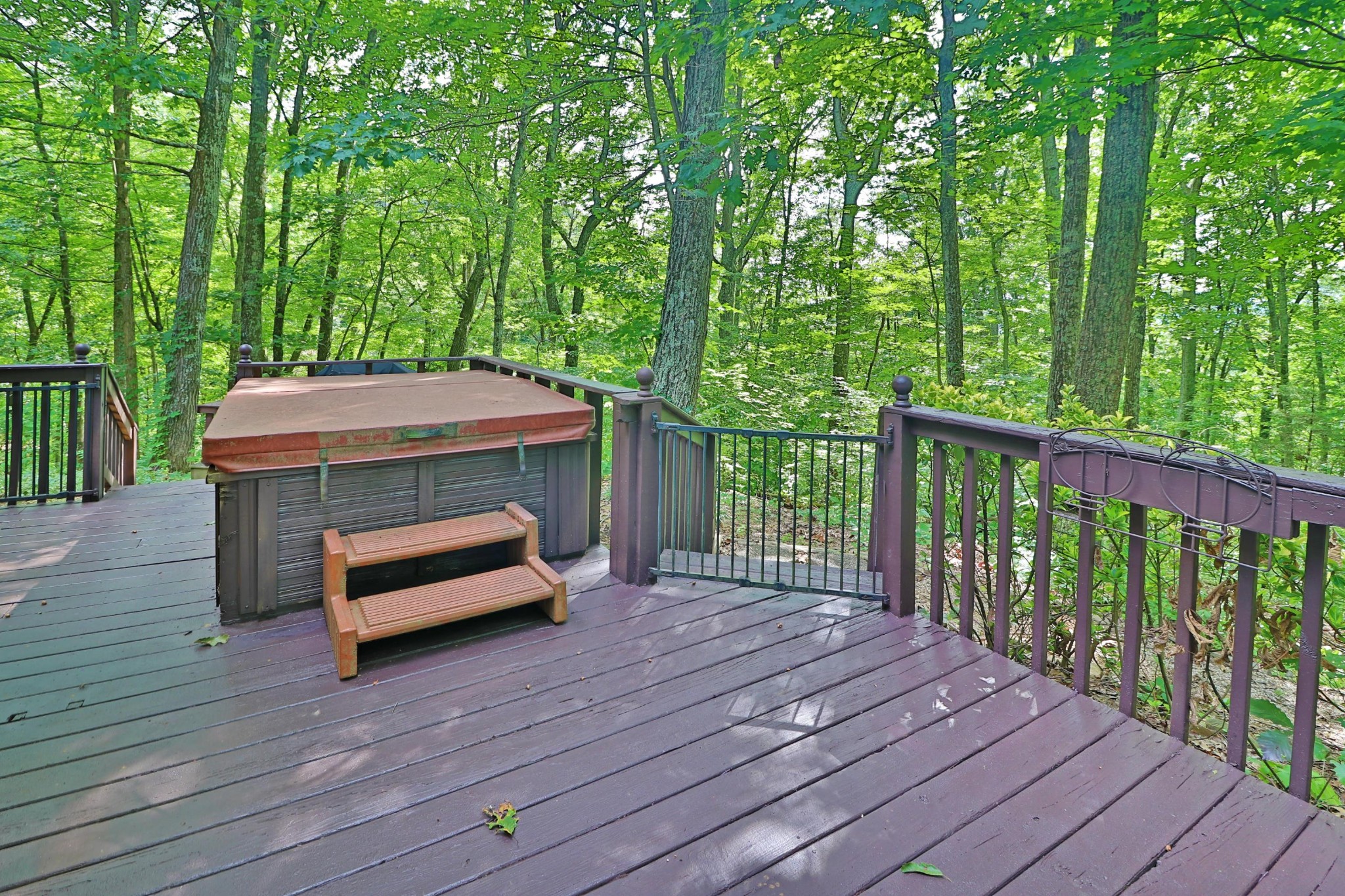 281 Lone Ridge Lane Clinton, TN 37716 - Photo 33 of 40 a backyard of a house with wooden floor and outdoor space