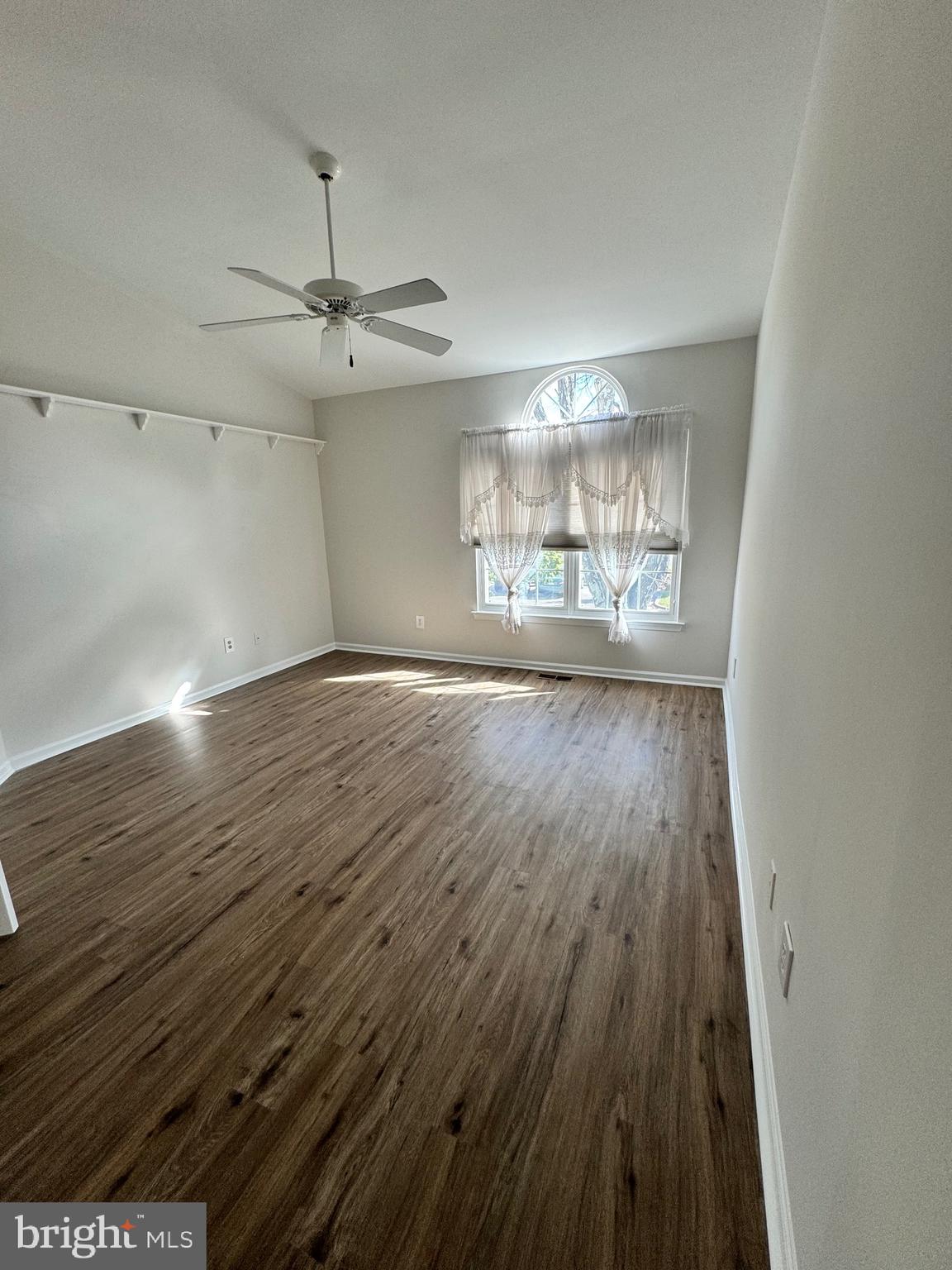 692 Danbury Court Newtown, PA 18940 - Photo 9 of 16 wooden floor in an empty room with a window