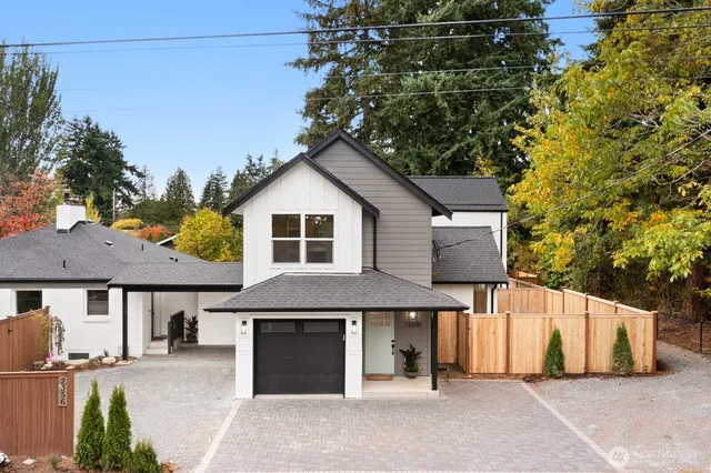 a front view of a house with a garage