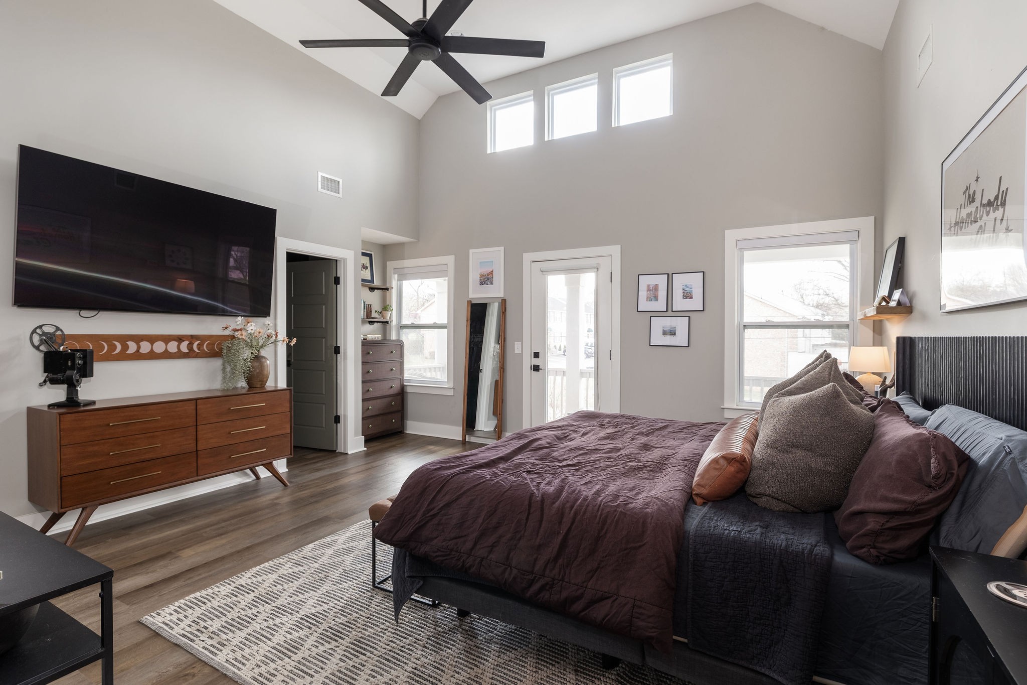 3415 Old Anderson Road Antioch, TN 37013 - Photo 14 of 46 a spacious bedroom with a bed and a flat screen tv