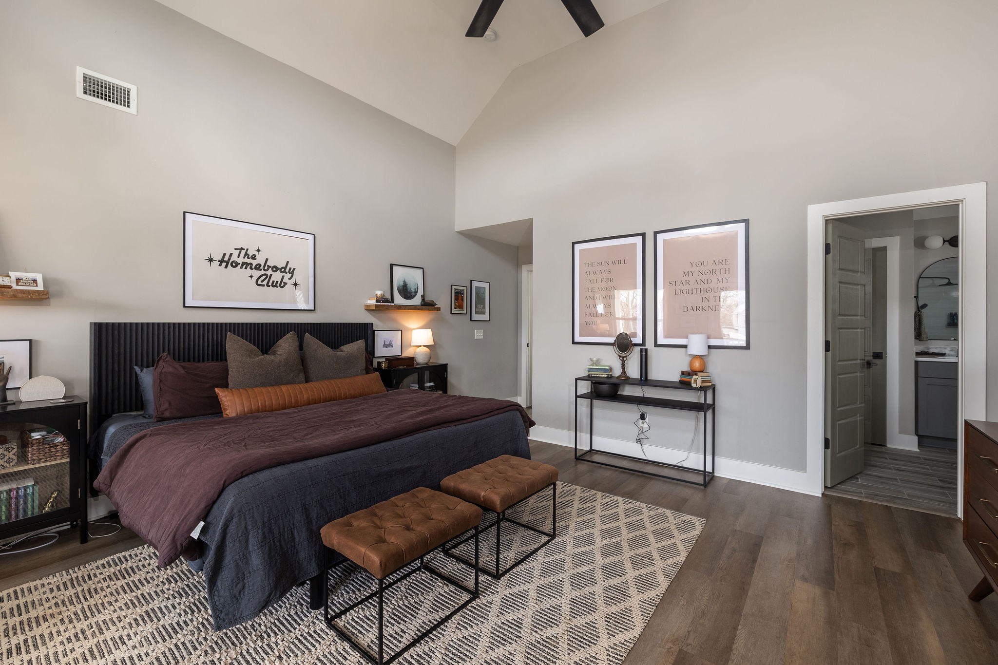 3415 Old Anderson Road Antioch, TN 37013 - Photo 19 of 46 a spacious bedroom with a bed a couch and wooden floor