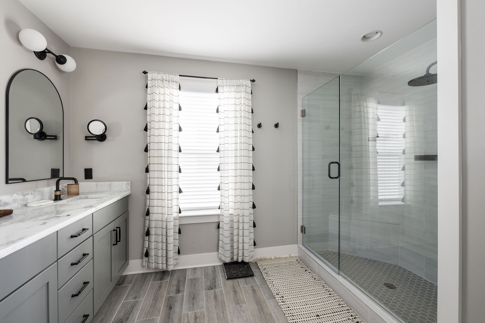 3415 Old Anderson Road Antioch, TN 37013 - Photo 25 of 46 a bathroom with a shower sink and mirror