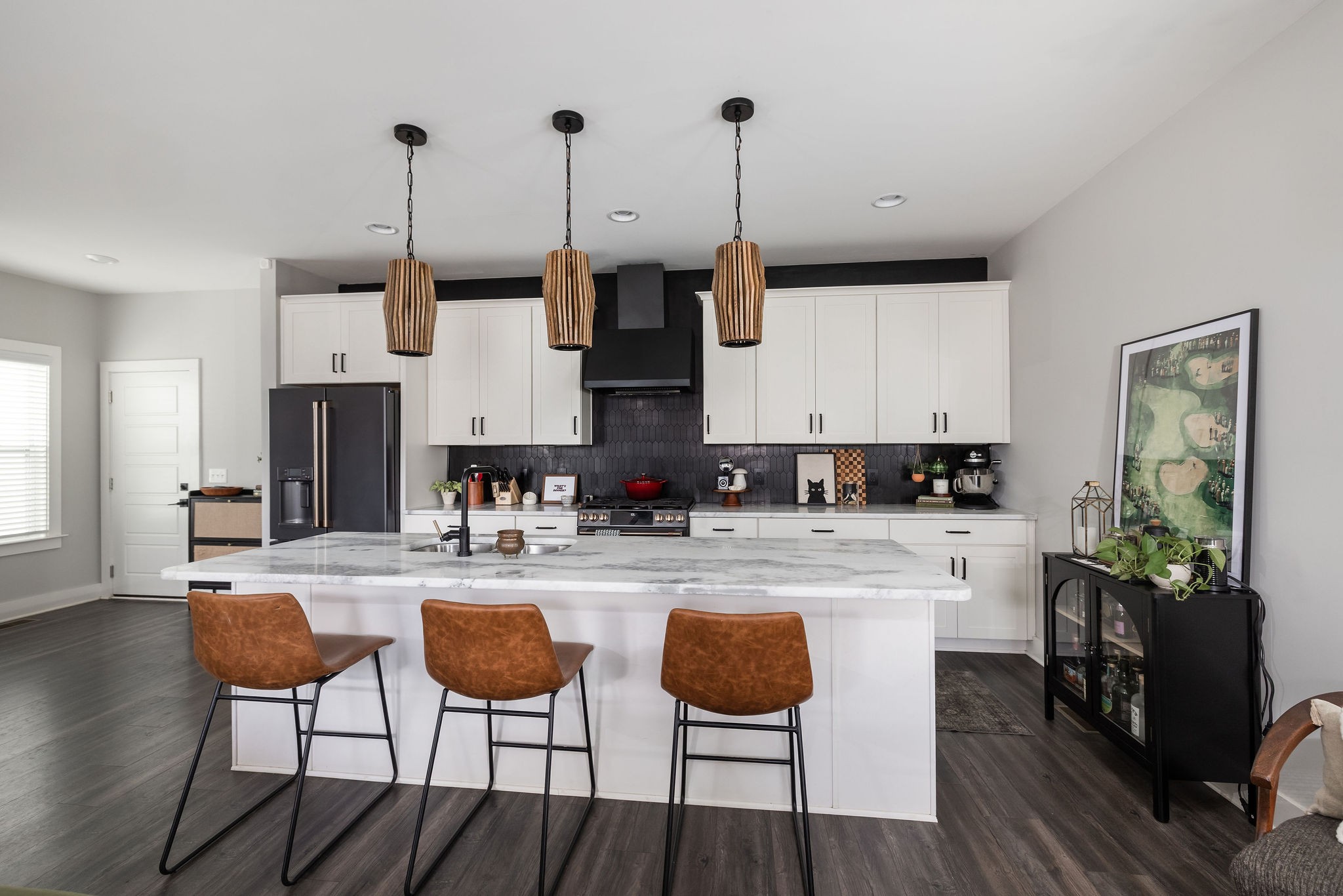 3415 Old Anderson Road Antioch, TN 37013 - Photo 6 of 46 a kitchen with stainless steel appliances kitchen island granite countertop a table and chairs