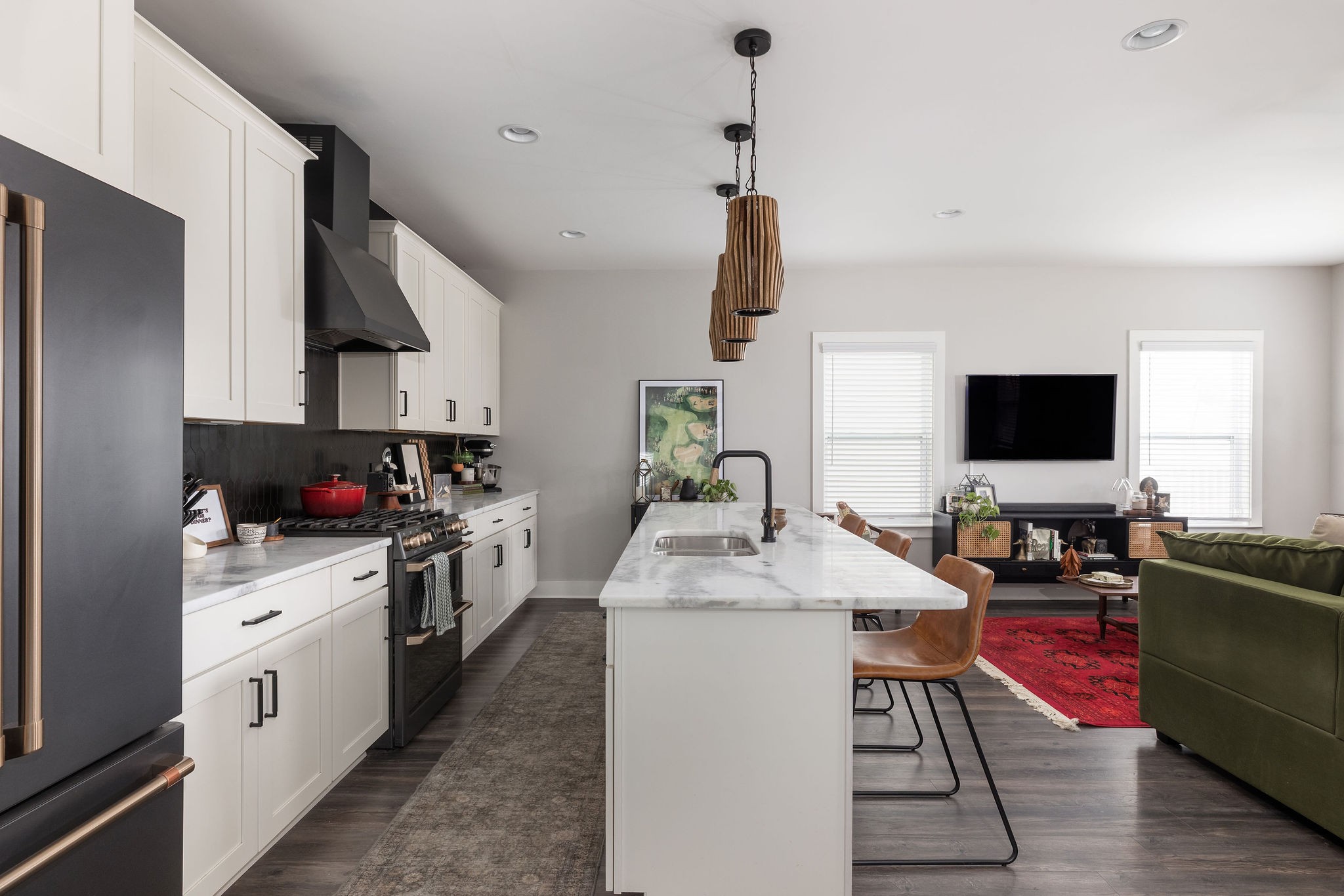 3415 Old Anderson Road Antioch, TN 37013 - Photo 7 of 46 a kitchen with stainless steel appliances kitchen island granite countertop a sink stove and refrigerator