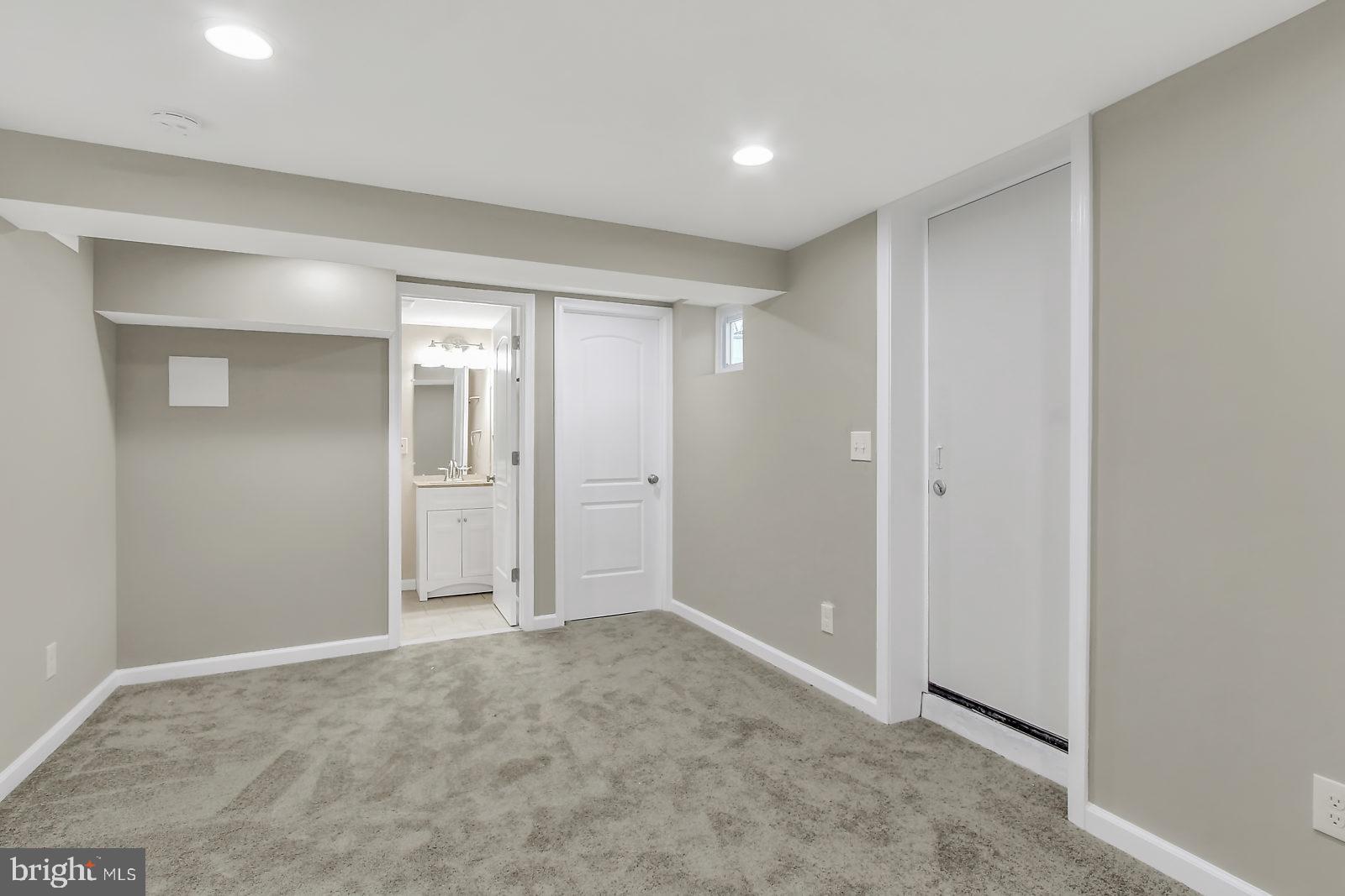 4059 Annellen Road Baltimore, MD 21215 - Photo 20 of 25 Basement Bedroom with private full bath