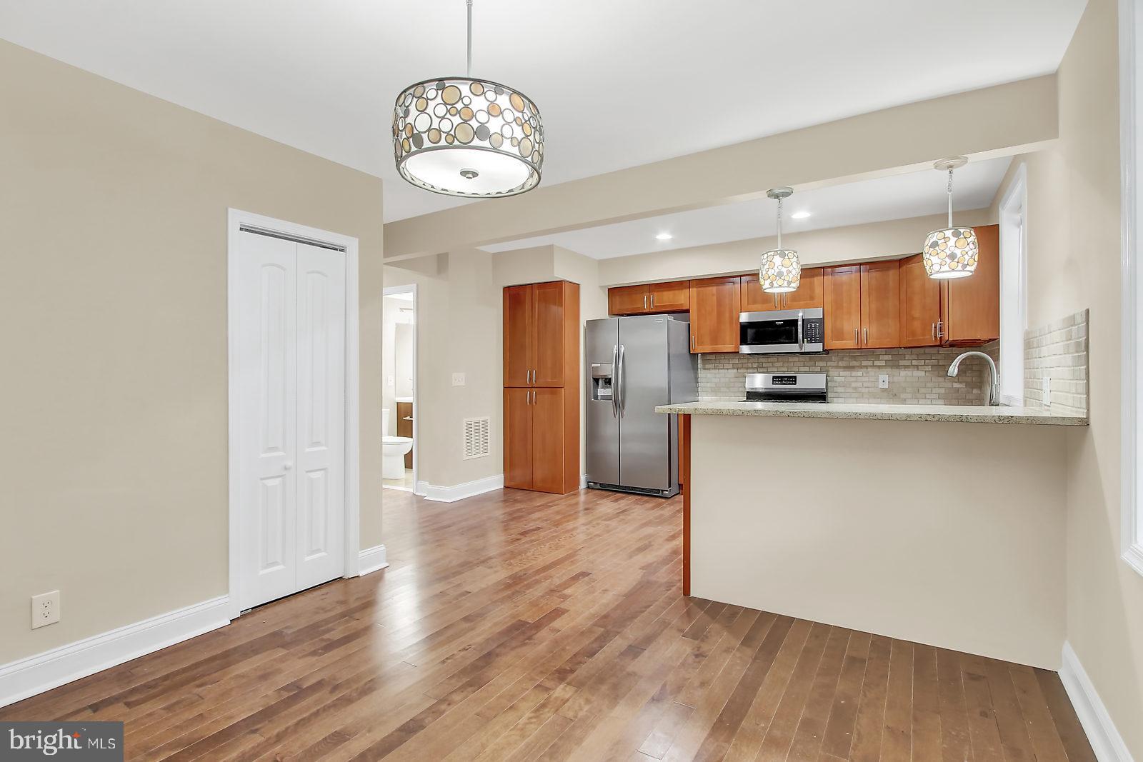 4059 Annellen Road Baltimore, MD 21215 - Photo 4 of 25 Dining Room and Kitchen