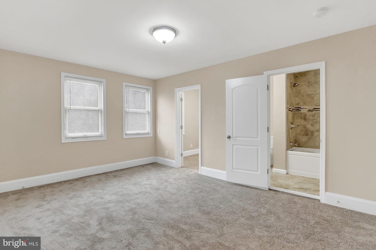 4059 Annellen Road Baltimore, MD 21215 - Photo 10 of 25 Master Bedroom w/attached bath & walk-in closet