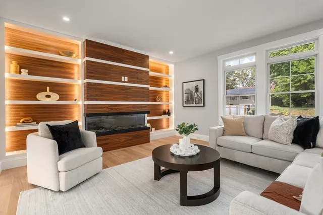 a spacious bedroom with a large bed and a large window