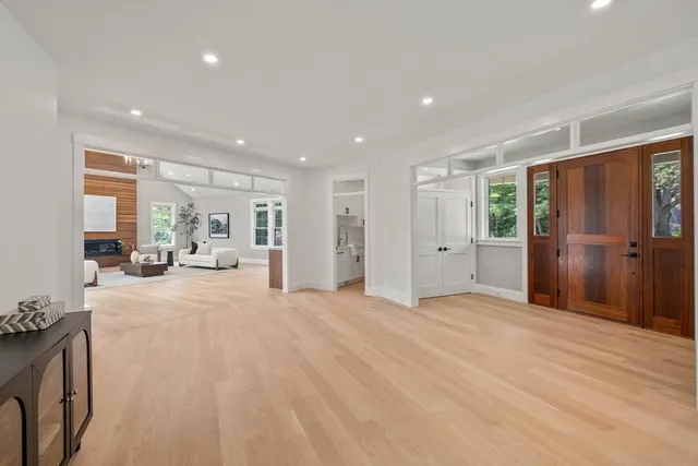 a kitchen with stainless steel appliances granite countertop a sink and cabinets