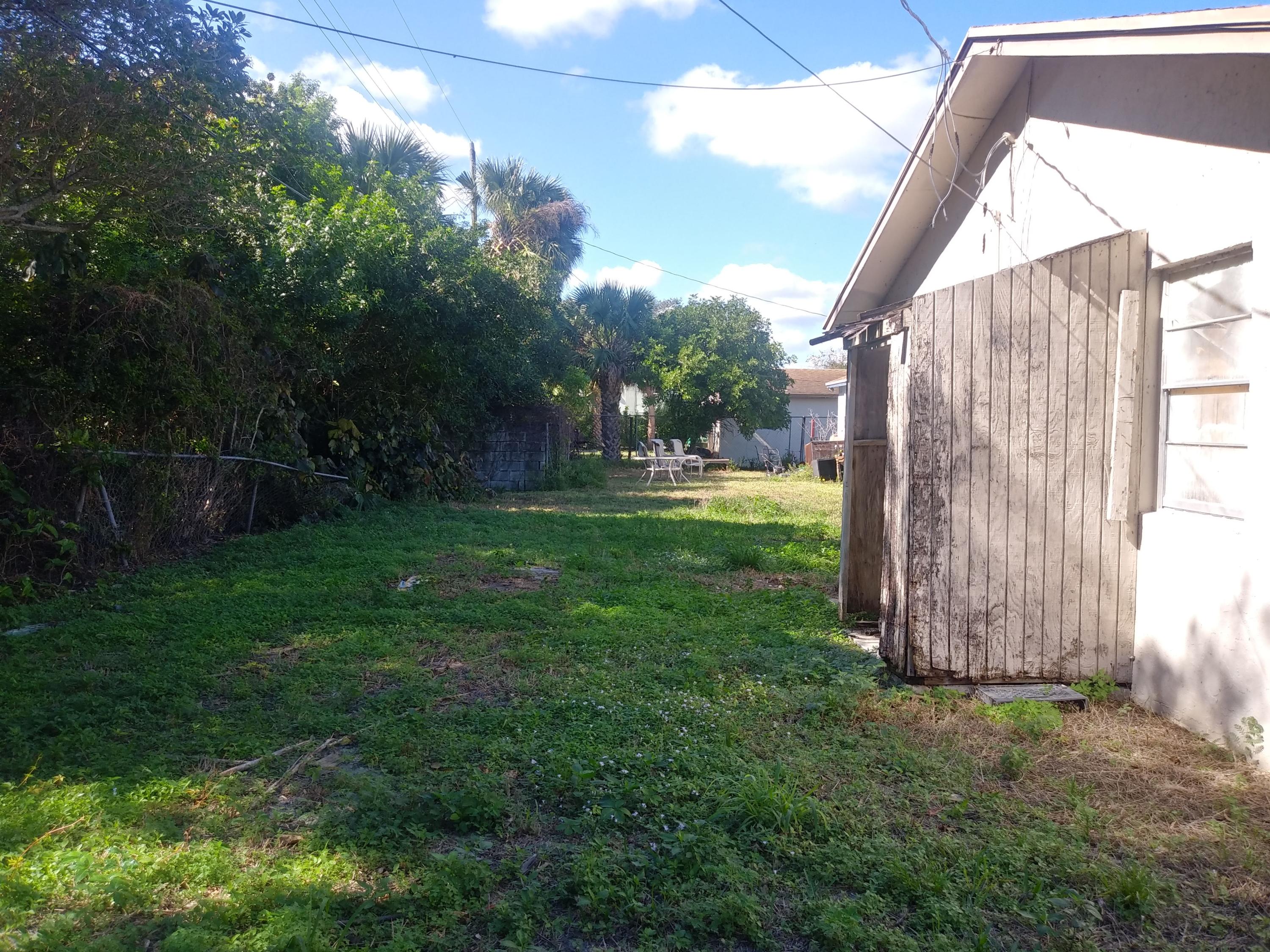 1971 West 13th Street Riviera Beach, FL 33404 - Photo 3 of 14 backyard