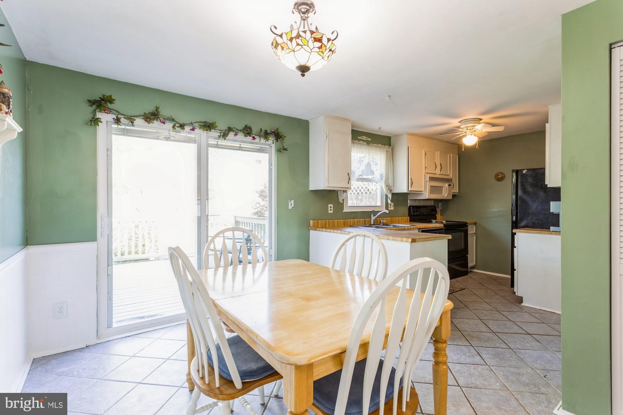 220 Drexel Drive Bel Air, MD 21014 - Photo 12 of 55 a view of a dining room with furniture window and outside view