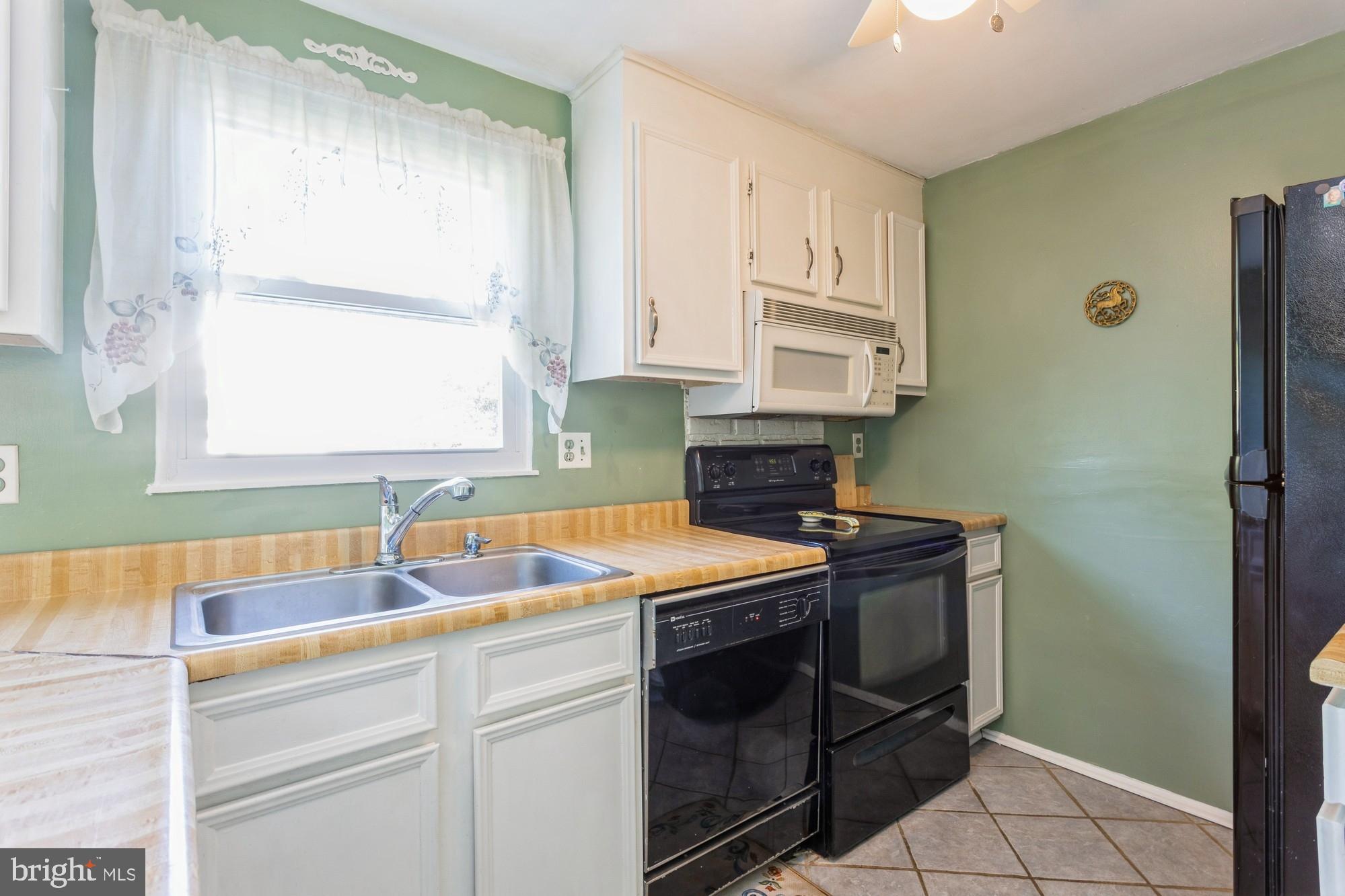 220 Drexel Drive Bel Air, MD 21014 - Photo 14 of 55 a kitchen with stainless steel appliances granite countertop a sink stove and cabinets