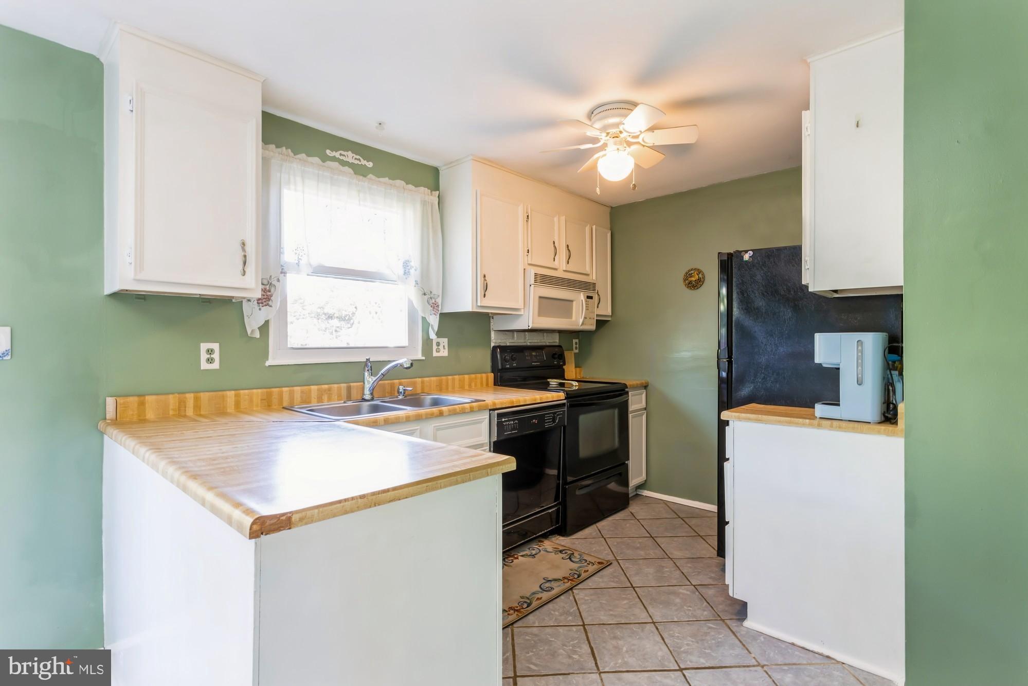 220 Drexel Drive Bel Air, MD 21014 - Photo 15 of 55 a kitchen with a cabinets and appliances