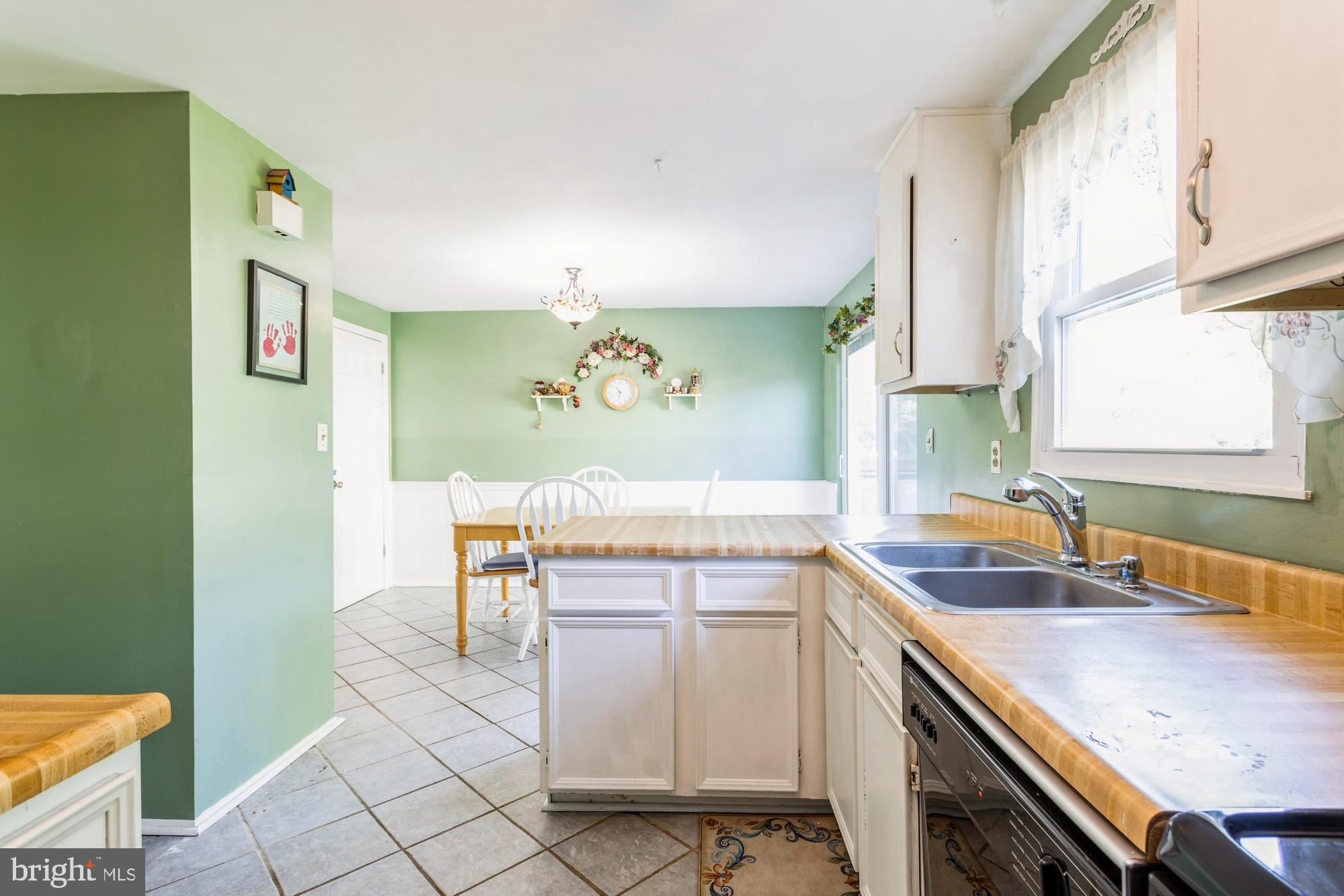 220 Drexel Drive Bel Air, MD 21014 - Photo 16 of 55 a kitchen with a sink cabinets and window