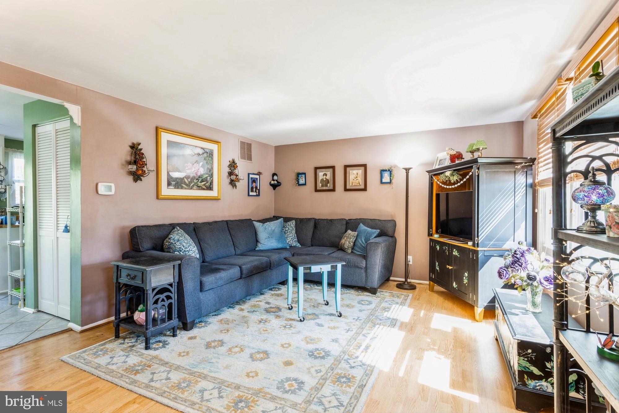 220 Drexel Drive Bel Air, MD 21014 - Photo 3 of 55 a living room with furniture and a flat screen tv