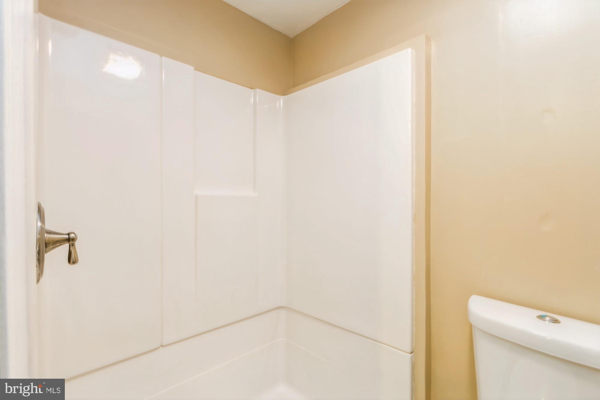 220 Drexel Drive Bel Air, MD 21014 - Photo 39 of 55 a bathroom with a shower and a toilet