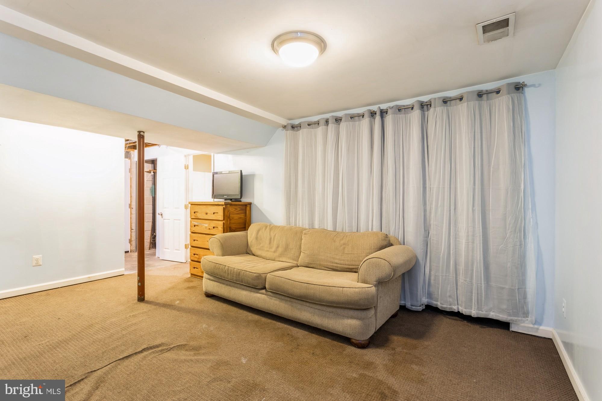 220 Drexel Drive Bel Air, MD 21014 - Photo 40 of 55 a living room with furniture and a large window
