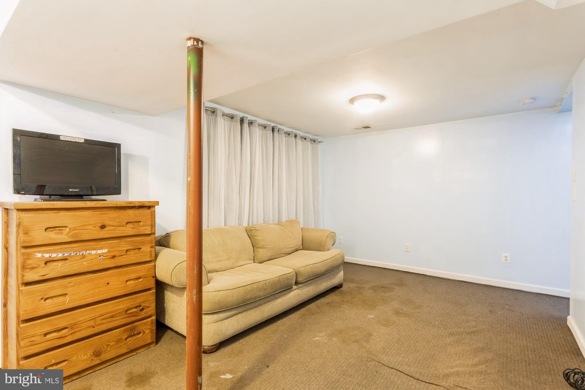 220 Drexel Drive Bel Air, MD 21014 - Photo 42 of 55 a living room with furniture and a flat screen tv