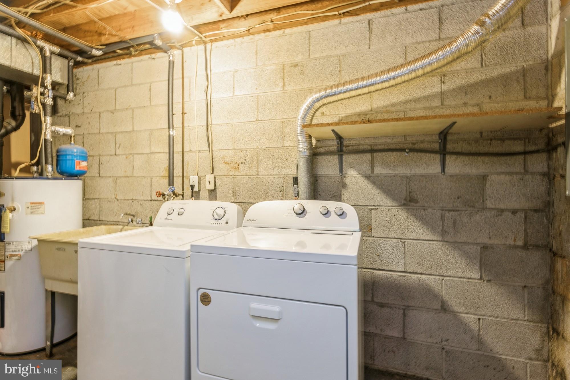 220 Drexel Drive Bel Air, MD 21014 - Photo 44 of 55 a utility room with dryer and washer