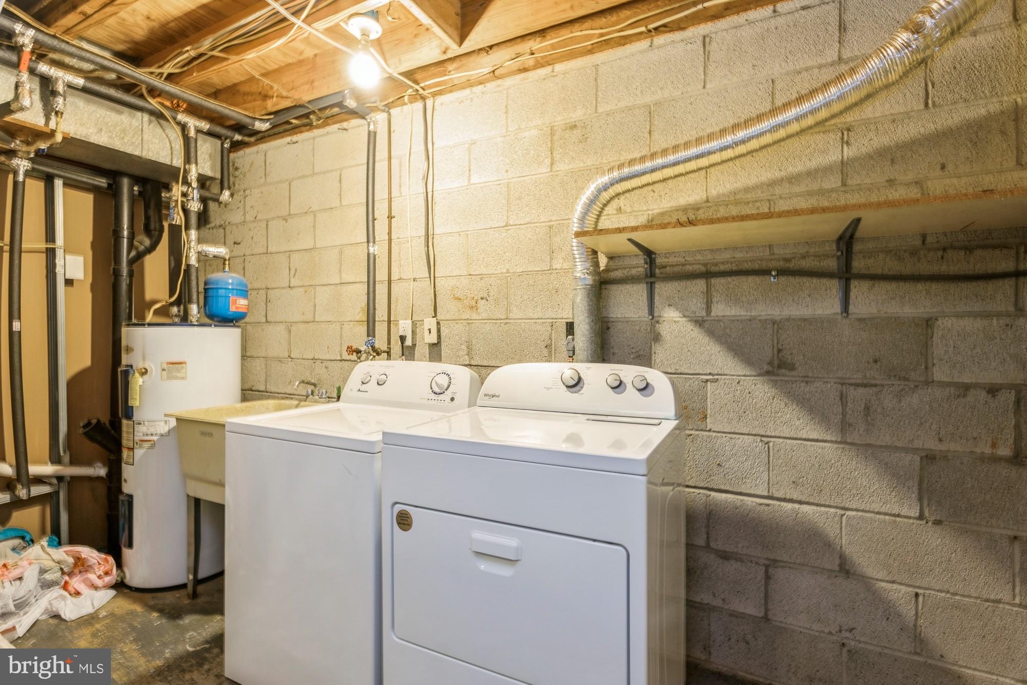 220 Drexel Drive Bel Air, MD 21014 - Photo 45 of 55 a utility room with dryer and washer