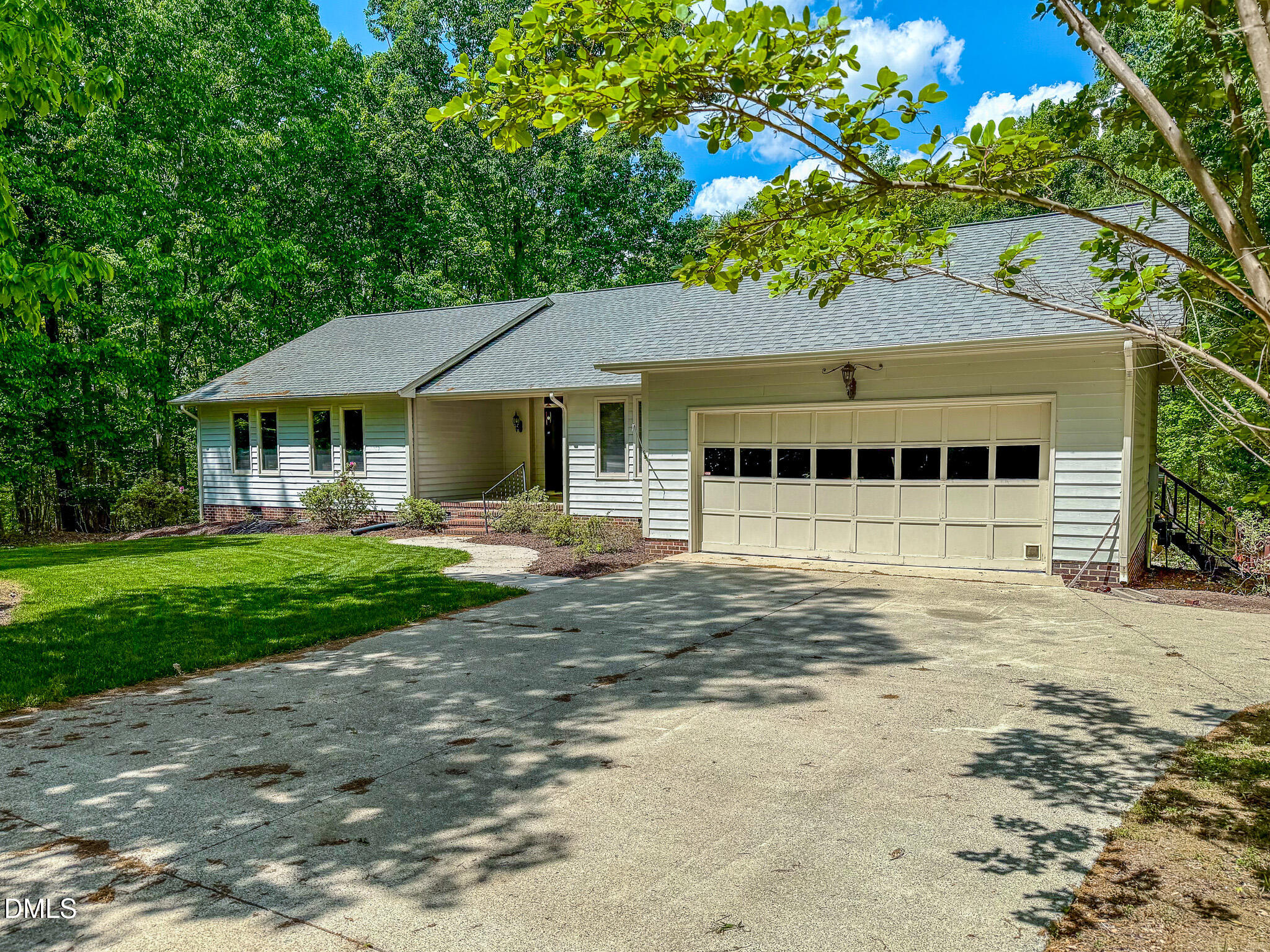 11 Denada Path Roxboro, NC 27574 - Photo 61 of 62 a front view of a house with a garden