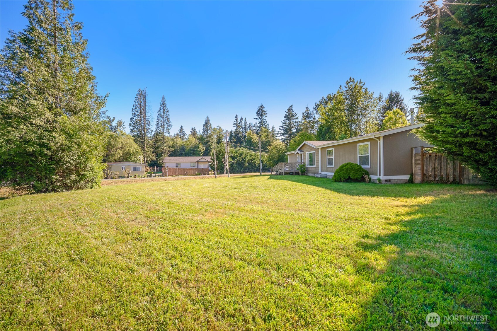 4230 Cody Road Blaine, WA 98230 - Photo 31 of 38 a view of a house with a yard