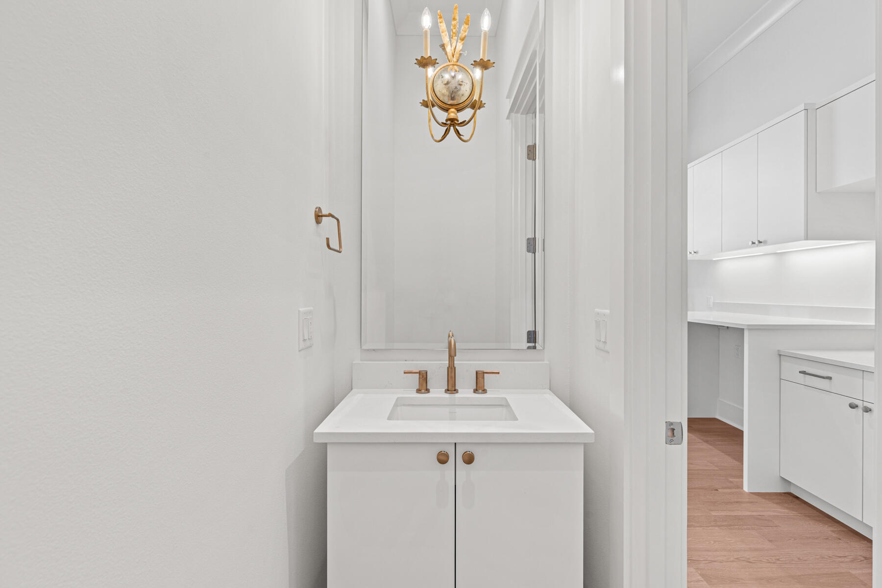 74 Pollard Cove West, Unit LOT 41 Watersound, FL 32461 - Photo 12 of 62 a bathroom with a sink and a mirror