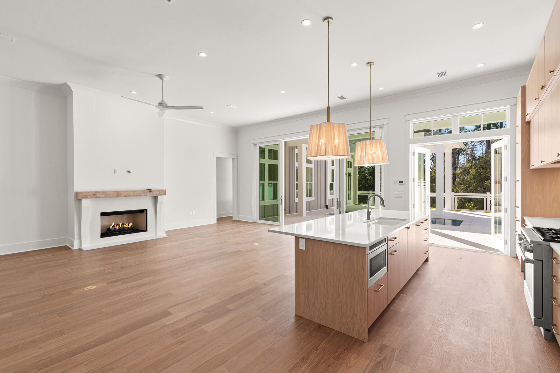 74 Pollard Cove West, Unit LOT 41 Watersound, FL 32461 - Photo 4 of 62 a large white kitchen with a large window