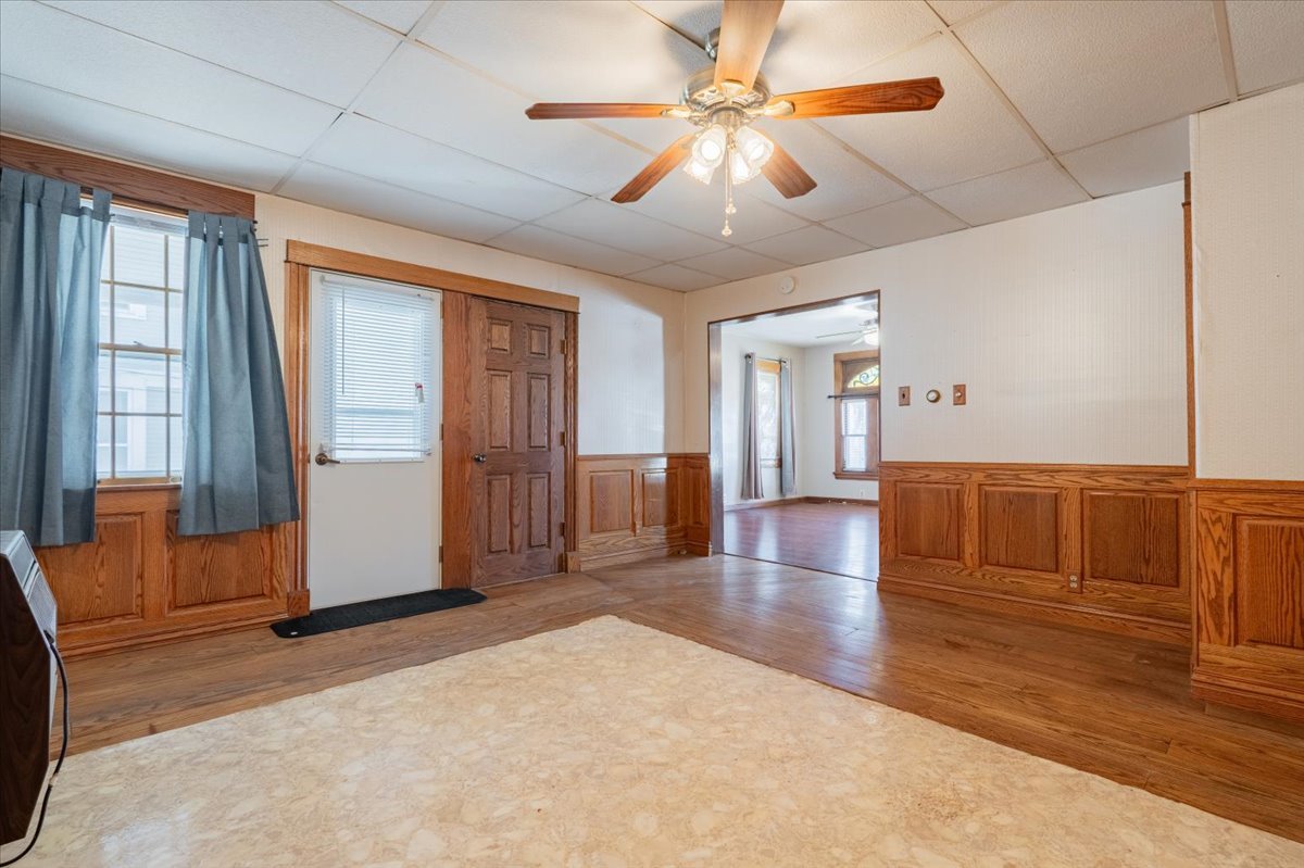 321 East 2nd Street El Paso, IL 61738 - Photo 11 of 37 a view of a livingroom with furniture wooden floor and window