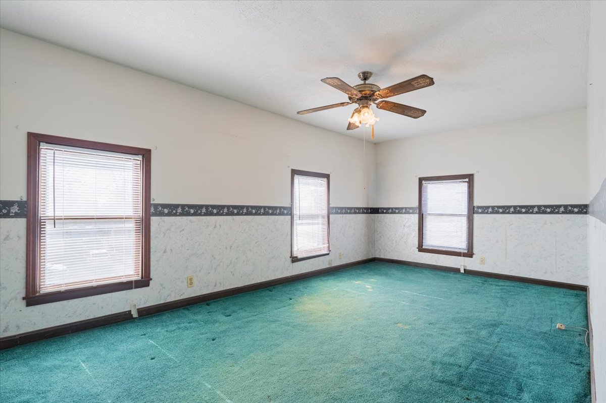 321 East 2nd Street El Paso, IL 61738 - Photo 18 of 37 a view of a room with window and a ceiling fan