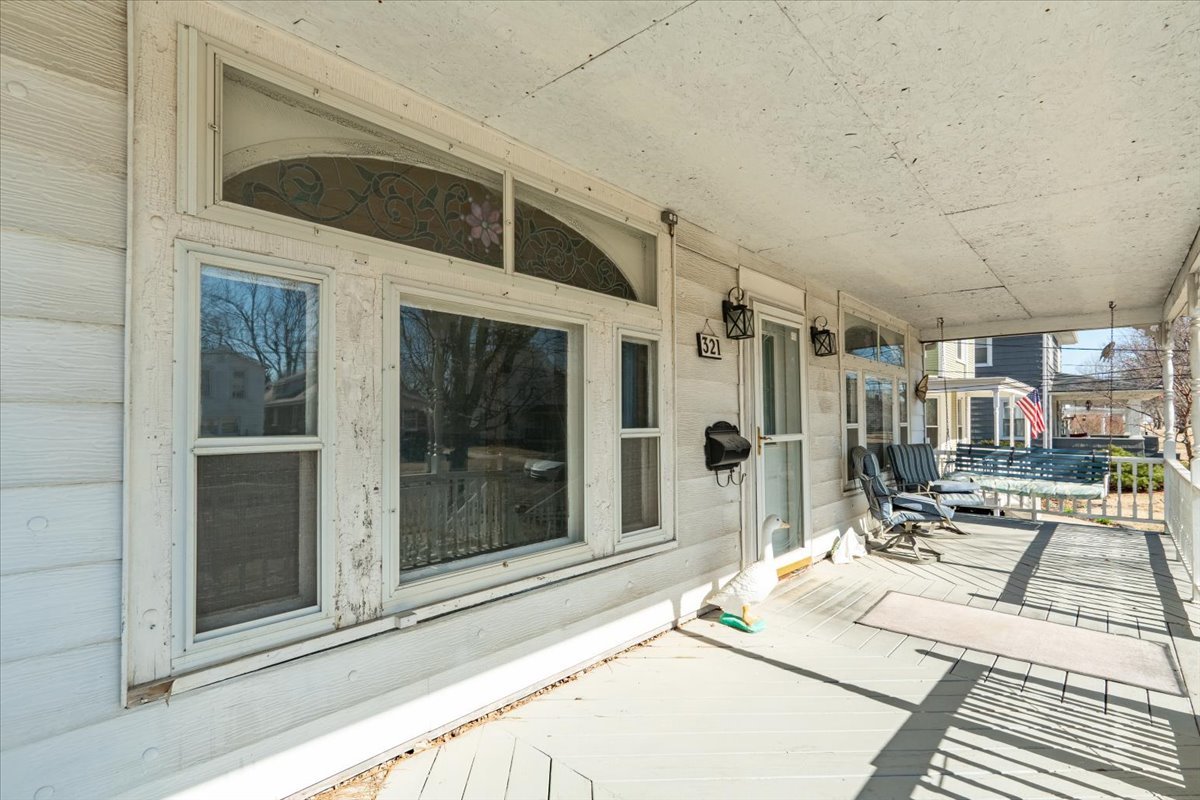 321 East 2nd Street El Paso, IL 61738 - Photo 4 of 37 a living room with a large window and furniture