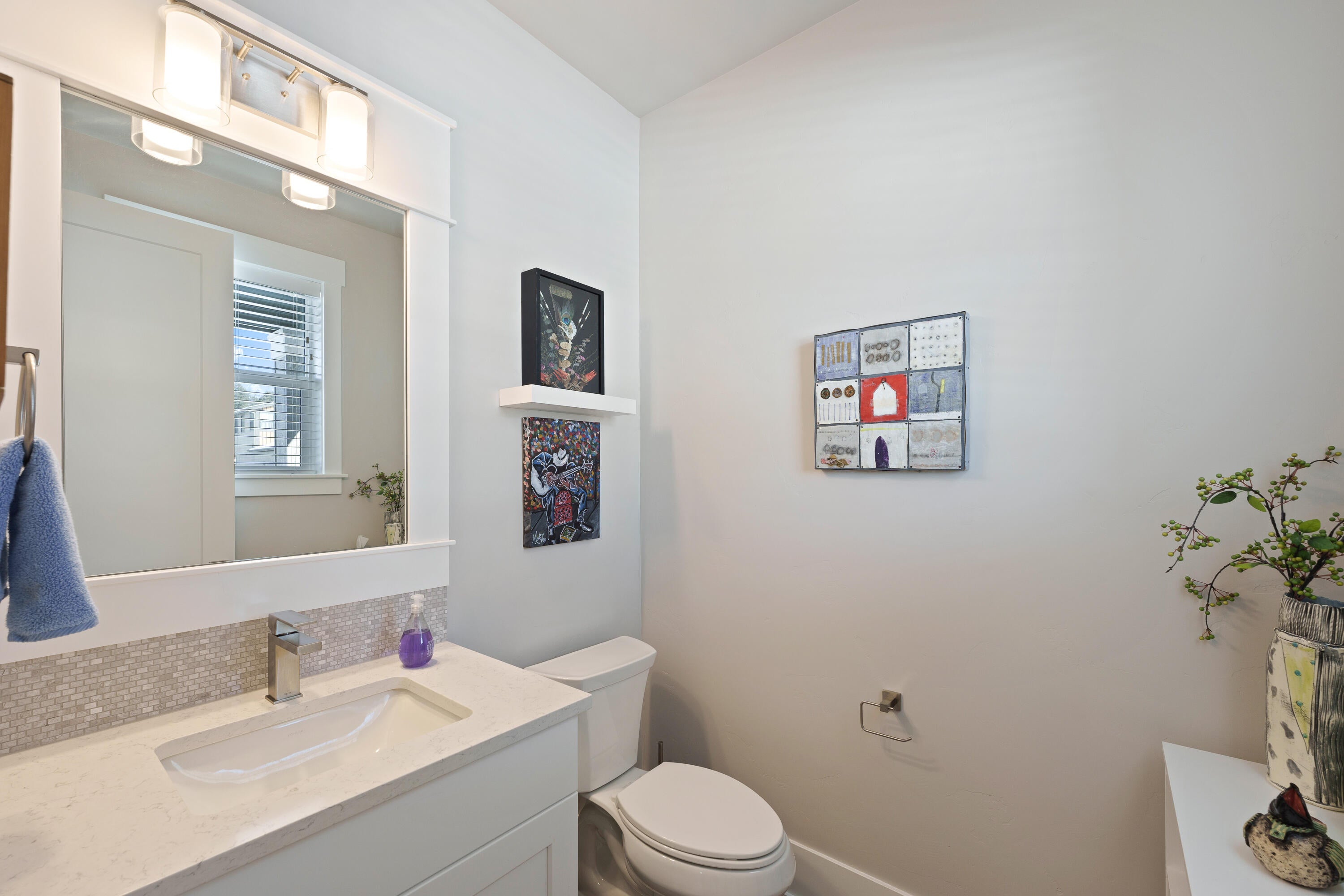 Powder Room located off entry hallway