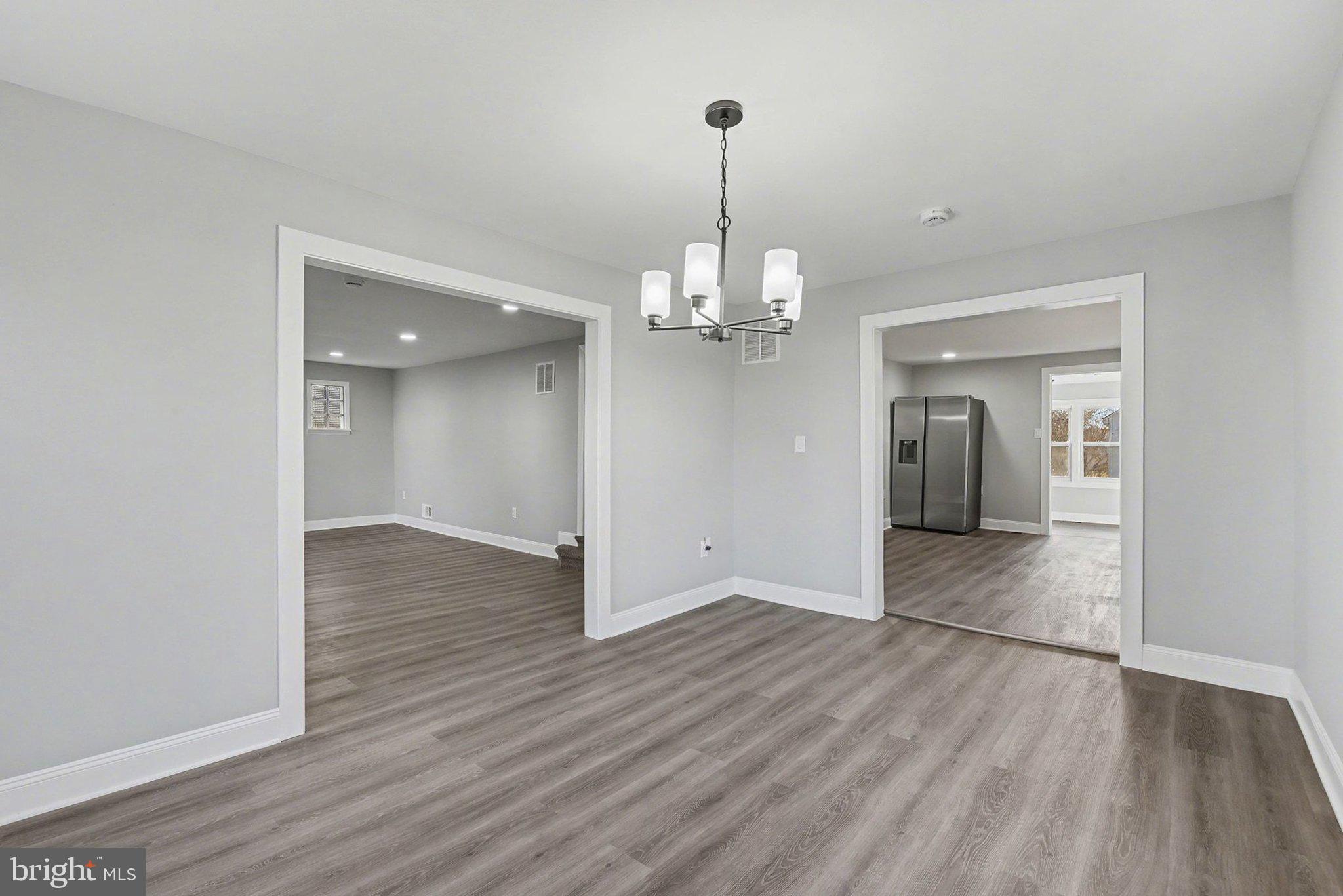 210 Beaver Road Harrisburg, PA 17112 - Photo 12 of 32 a view of empty room with wooden floor and window