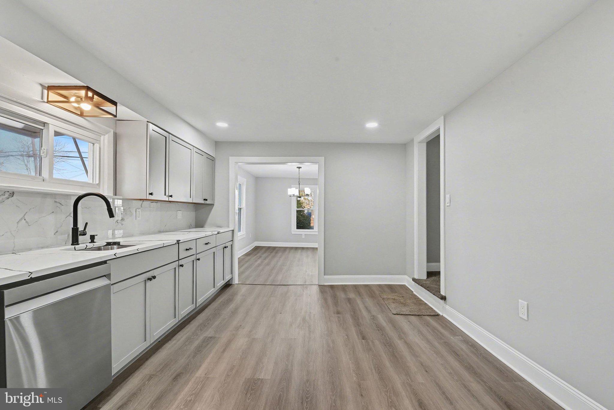 210 Beaver Road Harrisburg, PA 17112 - Photo 14 of 32 a view of a kitchen with a sink and wooden floor